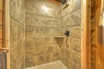 Lower Level Bathroom With a Large Tile Shower 
